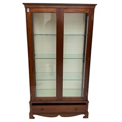 Mahogany illuminated display cabinet, fitted with three glass and drawer