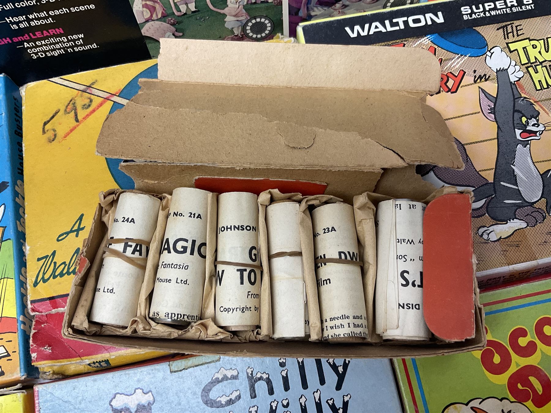 Corgi/Disney - Movie Vision, in original box, with Corgi projector, two Corgi Movie Viewers and nine films; together with 8mm film reels and strips to include Disney’s Dumbo, Mickey Mouse, Alice in Wonderland etc, most in original boxes