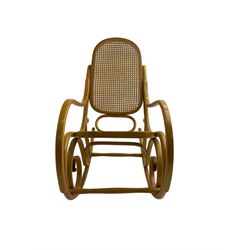 Early to mid-20th century Michael Thonet design bentwood rocking chair, with cane seat and back
