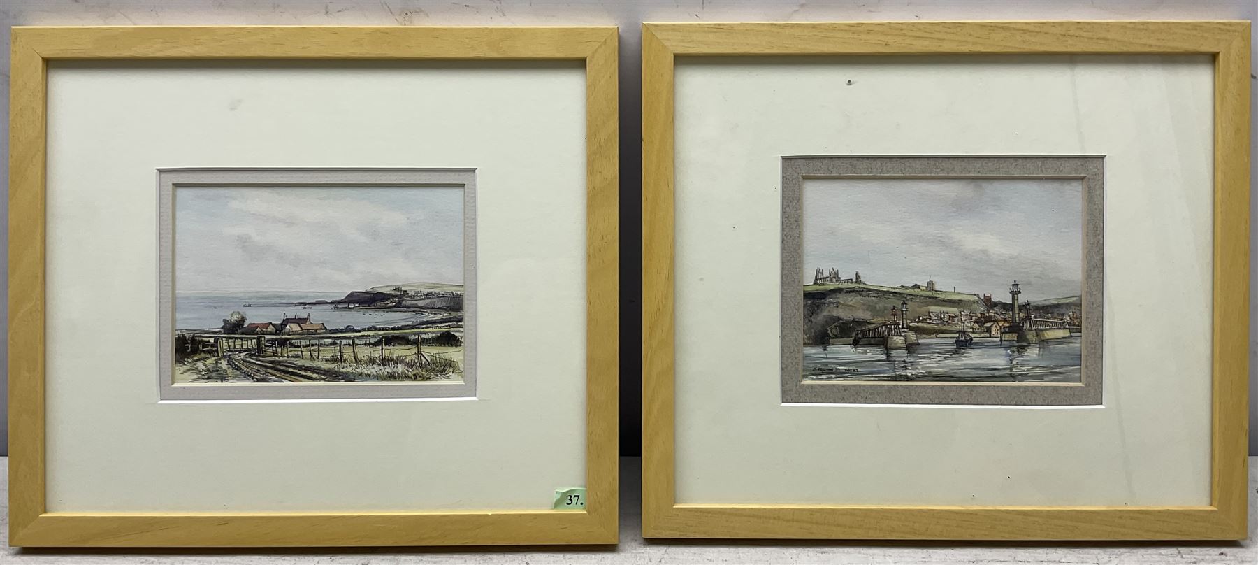 John Freeman (British 1942-): 'Whitby Harbour' 'Holy Island' Snow Scene and View Over Whitby, set of four watercolours signed and dated '75 through '79, variously titled verso 9cm x 13cm (4)