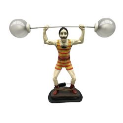 Composite table lamp, modeled as a strongman with the weights as lights, H56cm 