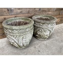 Pair of cast stone ornate circular planters