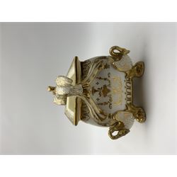 19th century Coalport bough pot, circa 1820, of bombe form, the body with twin handles surmounted by two birds and raised upon four feet modelled as swans, hand painted with two panels depicting an urn of flowers set against a mountainous landscape, the whole heightened in gilt throughout, H13cm L21cm