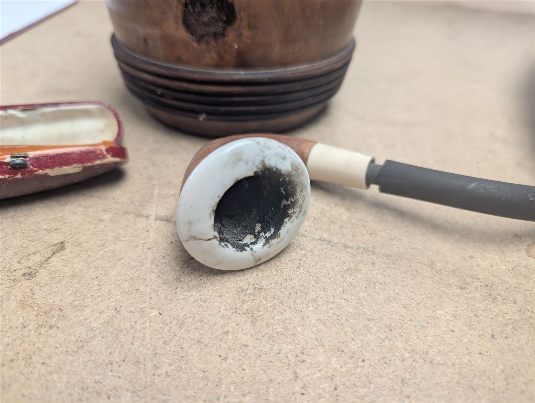 Turned wooden tobacco jar, pipe and an amber cheroot holder, H20cm