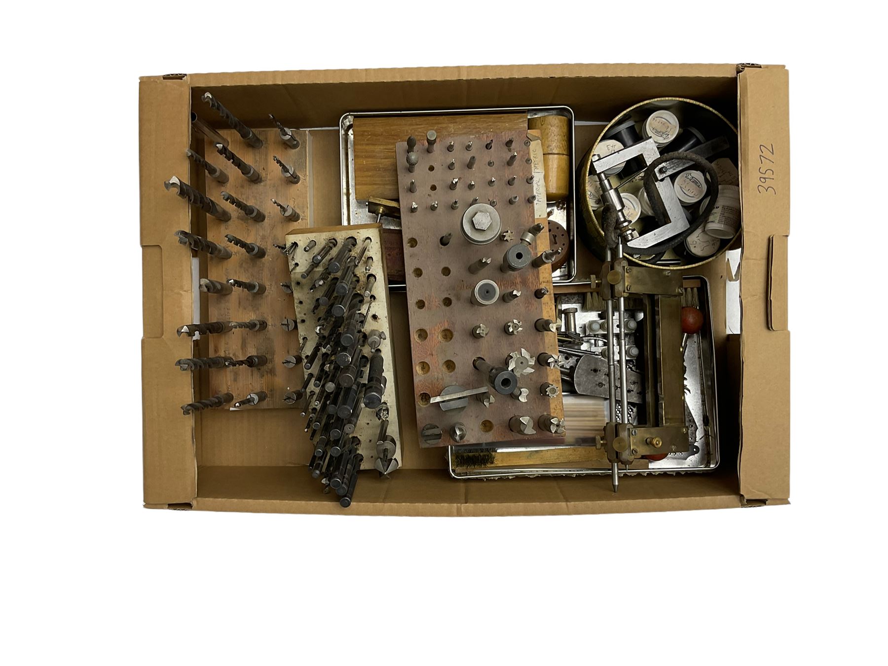 Assorted lathe drills, milling cutters, fly cutter frame and spindle with various fly cutters, clock depthing tool, other miscellaneous lathe and clockmaking hand tools.