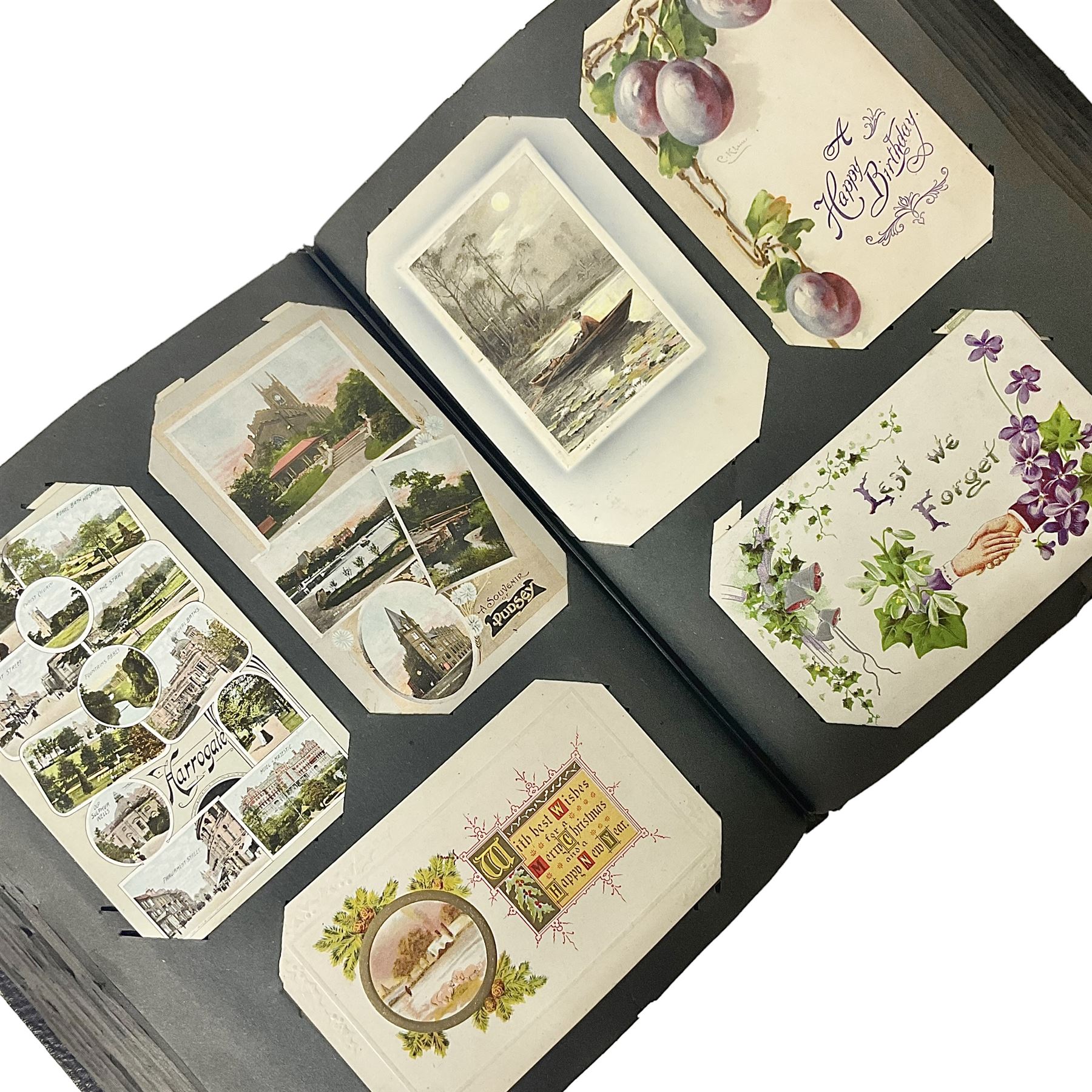 Postcard album with Victorian and later postcards, including silk cards, landscapes of the UK, portraits, Christmas cards etc  