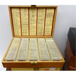  Large collection of 35mm slides including Pickering, Burniston, Scarborough, Helsmley and other areas of Yorkshire, North and East Devon, Scotland, Lisbon, Madeira etc mainly topographical views, architecture, churches, lighthouses, harbours etc, housed in twelve slide cases and other cases   