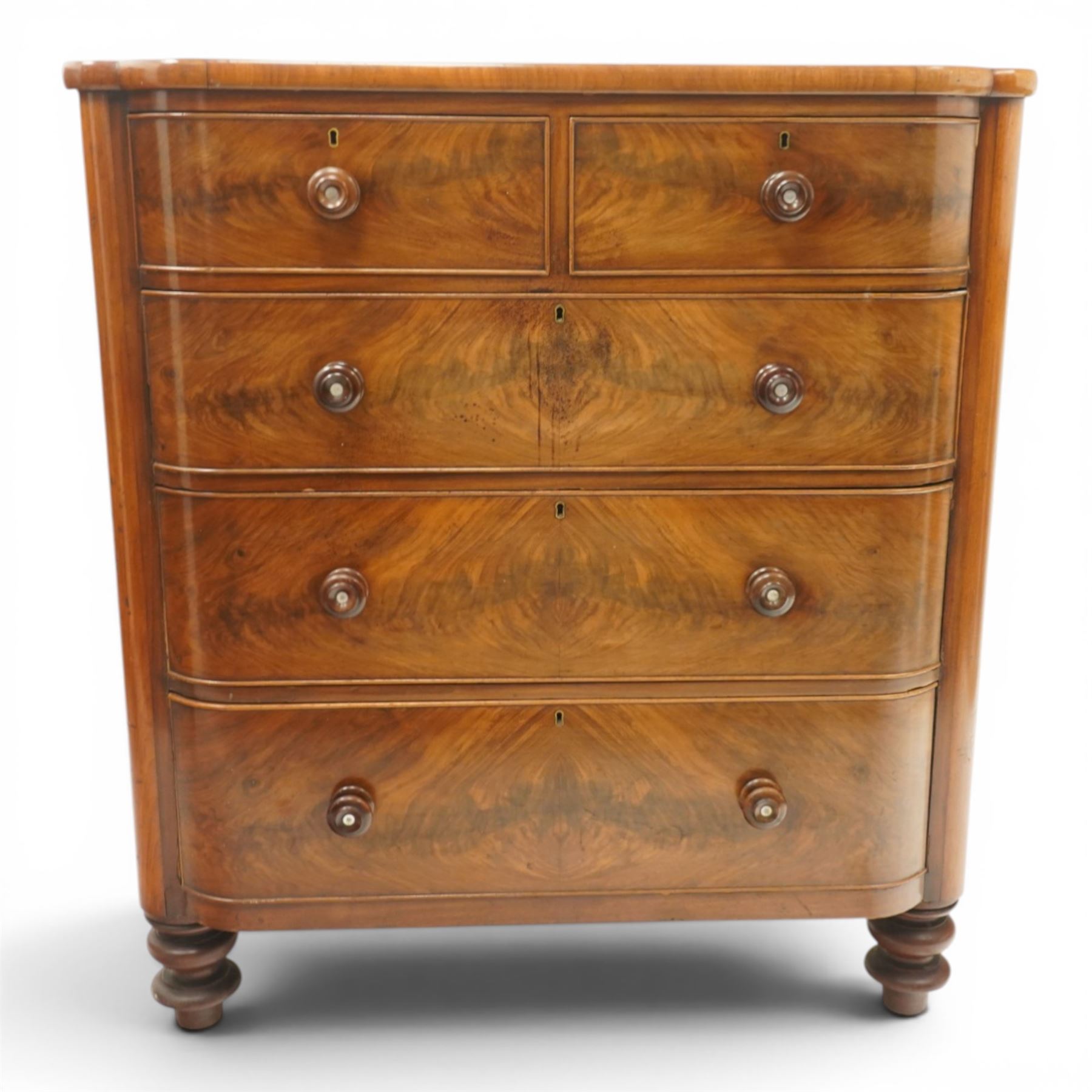 Victorian mahogany bowfront chest, with mahogany veneered drawers two over three drawers, turned handles with mother of pearl centres, raised on turned supports