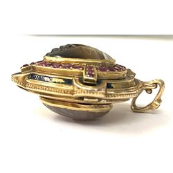 19th gold locket pendant, carved agate mask face, with ruby and black enamel surround, the reverse with hinged hardstone compartment