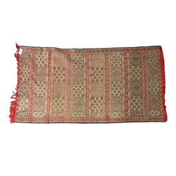 Turkish design red ground rug, decorated with geometric patterns