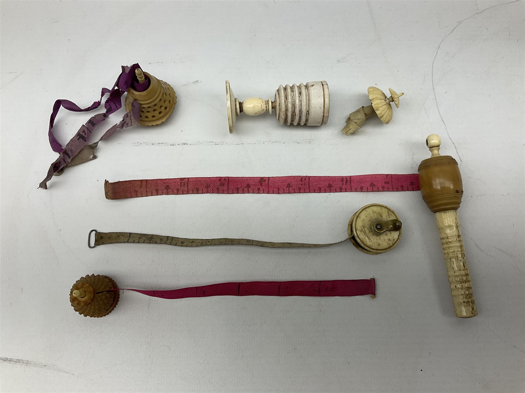 19th century bone and vegetable ivory sewing items including needles cases, pin cushions, thimble cases etc