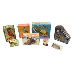 Seven modern Chinese, Japanese and Continental boxed tin-plate toys including Ucan Daire Flying Saucer, Drumming Animal, Circus Clown, Puzzle Cat, Bird with Jumping Action etc; and a quantity of clockwork toy keys (7)