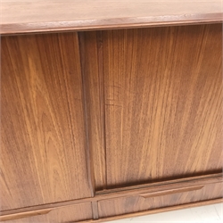 Danish teak side cabinet,  three sliding doors above three drawers, turned tapering supports, W166cm, H112cm, D44cm