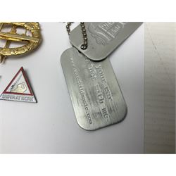 Two Edwardian hallmarked silver presentation fobs for military bugling competitions; and quantity of cap/glengarry and other badges, sweetheart brooches etc