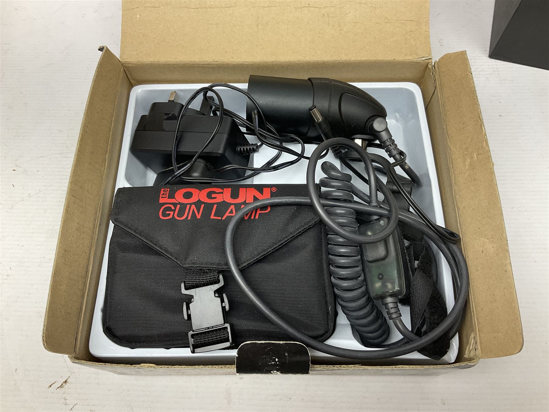 Four shooting accessories - Riflescope 3-9 x 50 scope; Digital Trail Camera; Megaorei M3 night sight add on; and Logan Gun Lamp; all boxed (4)