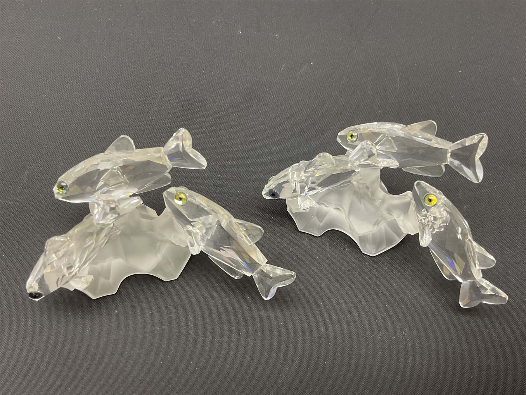 Swarovski Crystal sea creatures, comprising lion fish and dolphin, both with coloured elements, together with two seahorses, two small fish groups, butterfly fish, longnose butterfly fish and six coloured shells, tallest H8.5cm