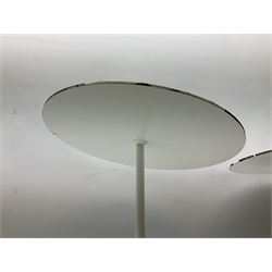 Two 1960s circular white finish cast metal stands, tilted top with slender stems and circular base, H37cm & H35cm (2)