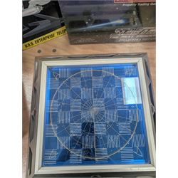 Star Trek Paramount Pictures Official Chess Set, incluidng glass board with removable lid, opening to reveal full set of gold and silver plated pewter figural chess pieces, with certificates, together with a Star Trek USS Enterprise Telephone, Star Trek Monopoly, 30th Anniversary DVD box set, Star Trek novels, DVDs, CDs, etc