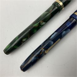 Two conway stewart 12 fountain pen 14ct gold nibs, in marble blue and marble green