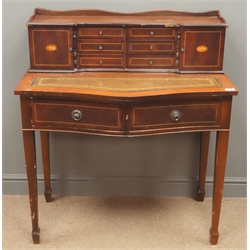  Reproduction inlaid mahogany serpentine front desk, six drawers and two cupboards, leather writing inset writing surface, two drawers, four tapered supports with spade feet, W92cm, H103cm, D50cm   