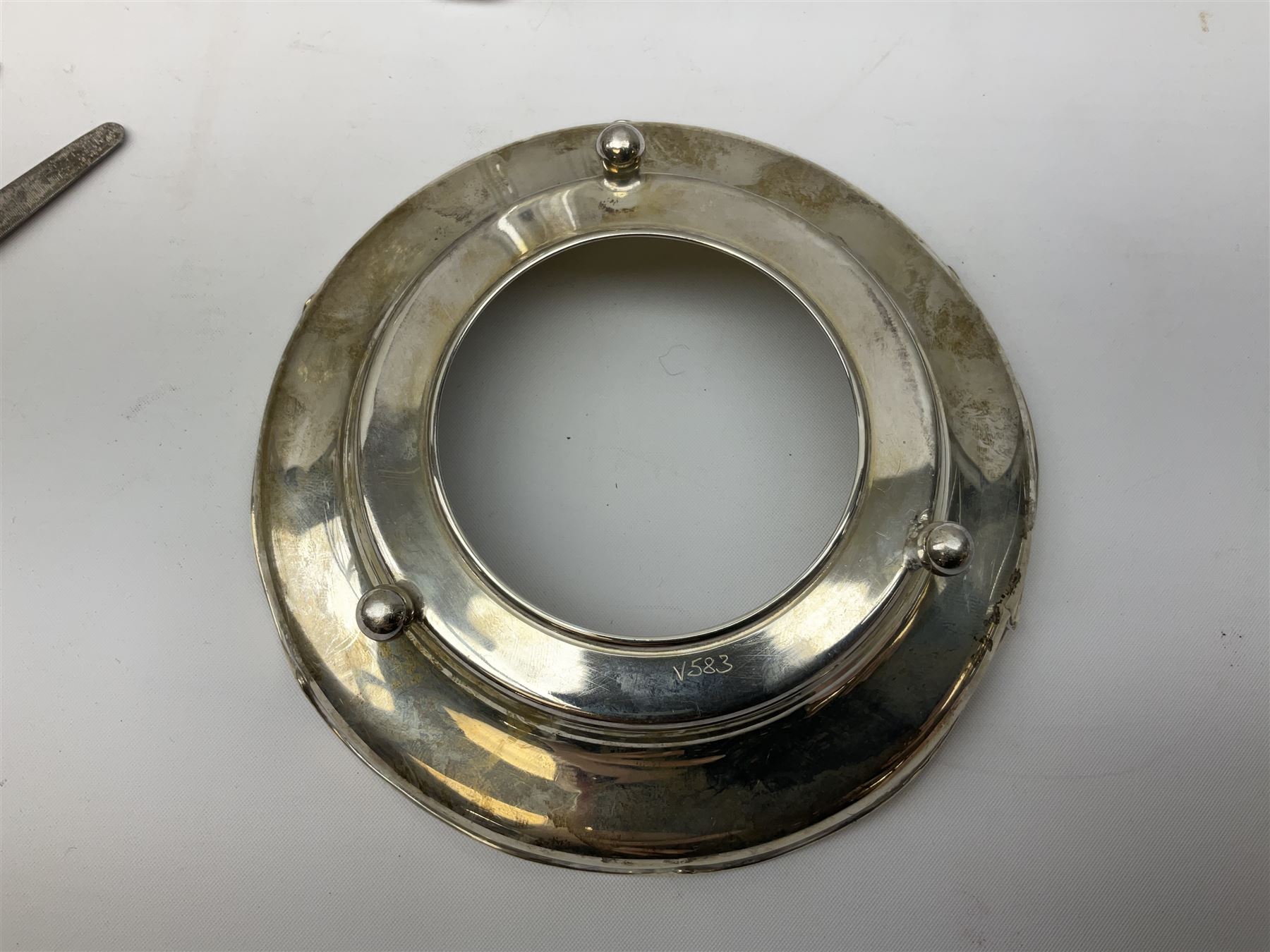 1920's silver stand, hallmarked Birmingham 1922, together with two tall faceted clear glass dressing table jars with hallmarked silver covers, and cut glass vase with hallmarked silver mounted collar, and small group of silver handled accessories, including files, picks, etc., approximate total silver weight 58.8 grams