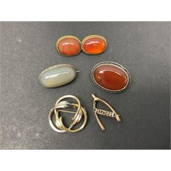 9ct gold jewellery including leaf brooch, wishbone Mizpah brooch, carnelian brooch, gold cased ladies Omega wristwatch, on leather strap and gold cased ladies Tissot wristwatch on expanding gilt strap, together with silver brooches and a Czech paste buckle, etc
