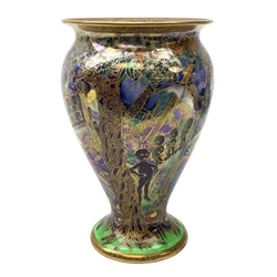 Wedgwood Fairyland Lustre vase, designed by Daisy Makeig Jones, of baluster form decorated with the Imps on a Bridge pattern, painted with a procession of imps crossing a bridge set within a fantasy landscape, heightened with gilt detail throughout, with printed and painted marks beneath, H22.5cm