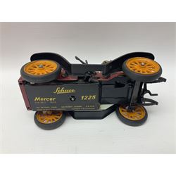Schuco - seven tinplate model vehicles comprising two 5552 Electro Submarino, two 1050 (2098) racing cars numbered 6 and 8, one blue unnumbered 1050 racing car, one 1225 Mercer 1913 and an unpainted Examico 4001 car 