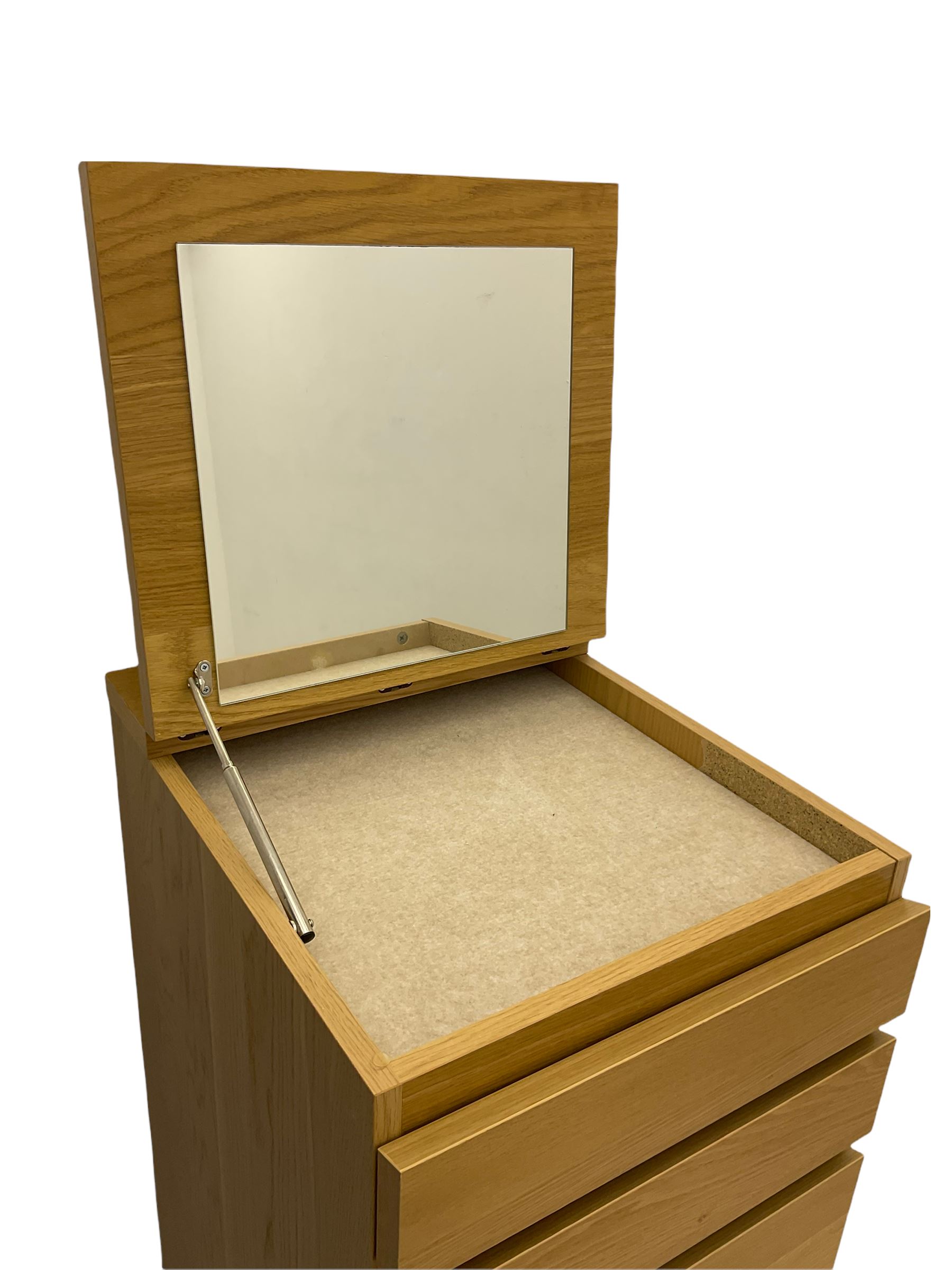 IKEA light oak finish chest, fitted with hinged vanity top, above six graduating drawers 