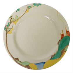 Clarice Cliff Secrets pattern plates, circa 1933, hand painted with a shoulder variant of a tree and cottage landscape, with Bizarre and printed marks to base, D23cm and D18cm