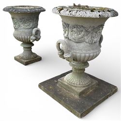 Pair of large stone Campana urns on square bases