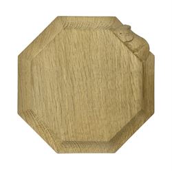 Mouseman; Yorkshire oak small octagonal chopping board, carved mouse signature, by Robert Thompson of Kilburn, D19cm