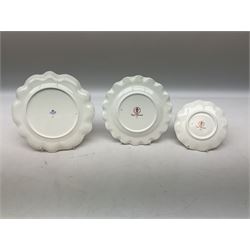 Coalport Revelry pattern tea and dinner wares, comprising nine dinner plates, four salad plates, eleven side plates, sauce boat and stand, ten teacups and ten saucers, and preserve pot and cover, together with a Coalport plate of shaped form decorated with pink roses, and a Royal Crown Derby Royal Antoinette pattern trio