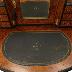19th century French inlaid figured walnut and ebonised Bonheur de Jour or writing desk, the raised upper section with pierced brass three-quarter gallery, over a mirror glazed cupboard and a combination of drawers, the shaped and moulded top with leather inset and satinwood stringing, with brass beading too the ebonised edge, fitted with a serpentine fronted frieze drawer, raised on cabriole supports, inlaid throughout with scrolling foliate decoration in boxwood and ornate cast brass mounts and handles