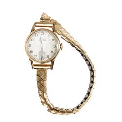 Two 9ct gold manual wind wristwatches, hallmarked, on on a leather strap, the other on a expanding gold-plated strap