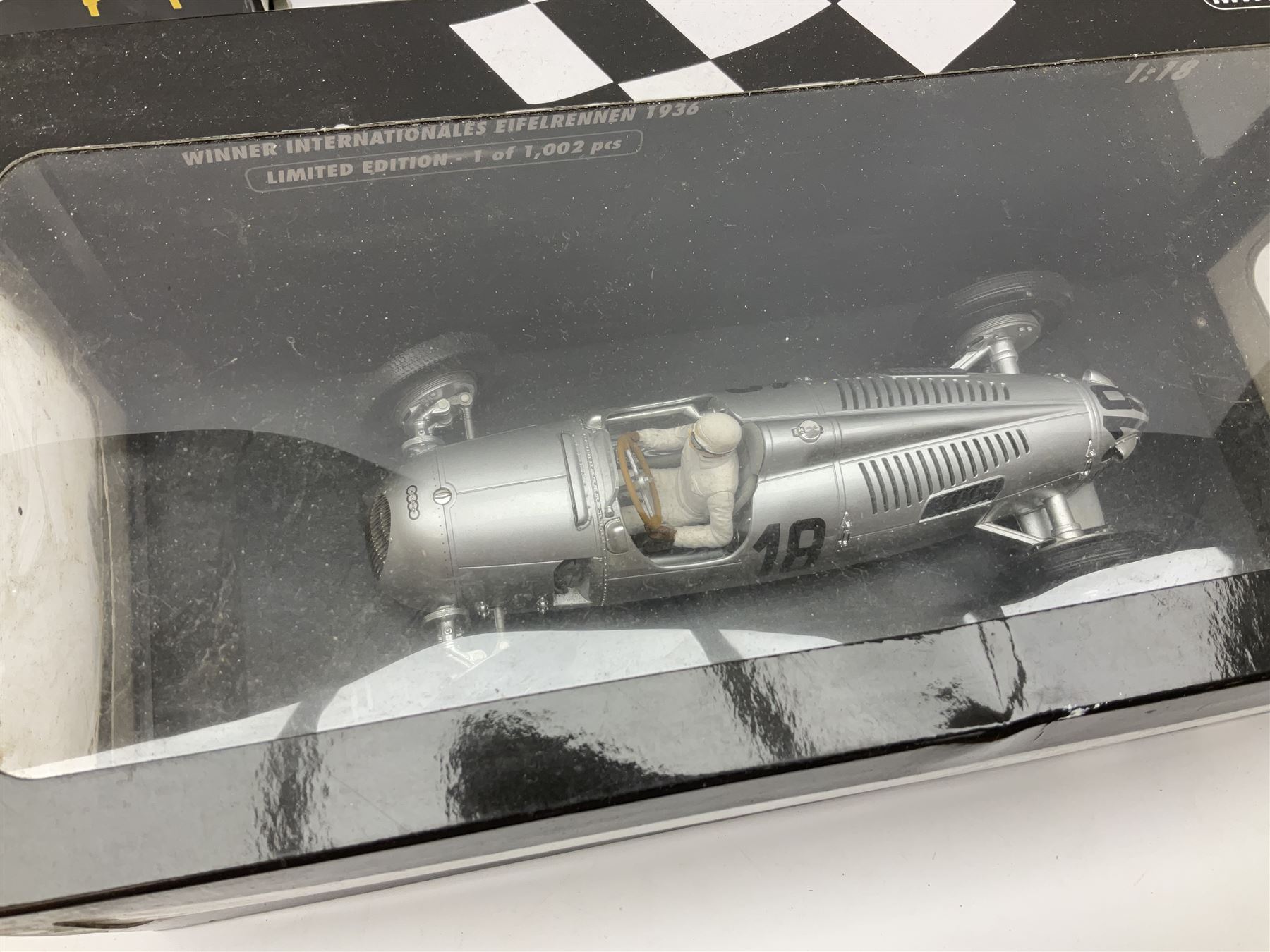 Two Collezione Classico large scale die-cast models of a Ferrari 1972 312P with Racing Fuel Pump and Ferrari 1958 250 Testa Rossa with Road Fuel Pump; and two Minichamps 1:18 scale models of a McLaren Mercedes Racing Car and Auto Union Typ C racing car; all boxed (4)