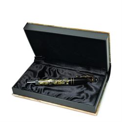 Montblanc Meisterstück Oscar Wilde limited edition fountain pen, black resin cap and barrel with marbled ivory and black patterned lower barrel and gold-plated fittings, the cap signed with Oscar Wilde facsimile and surmounted by the white star emblem, fitted with a medium 18K (750) gold nib engraved 4810, 1994 and MONTBLANC, model no. 28616, presented in original lined fitted case in the form of a book with outer box