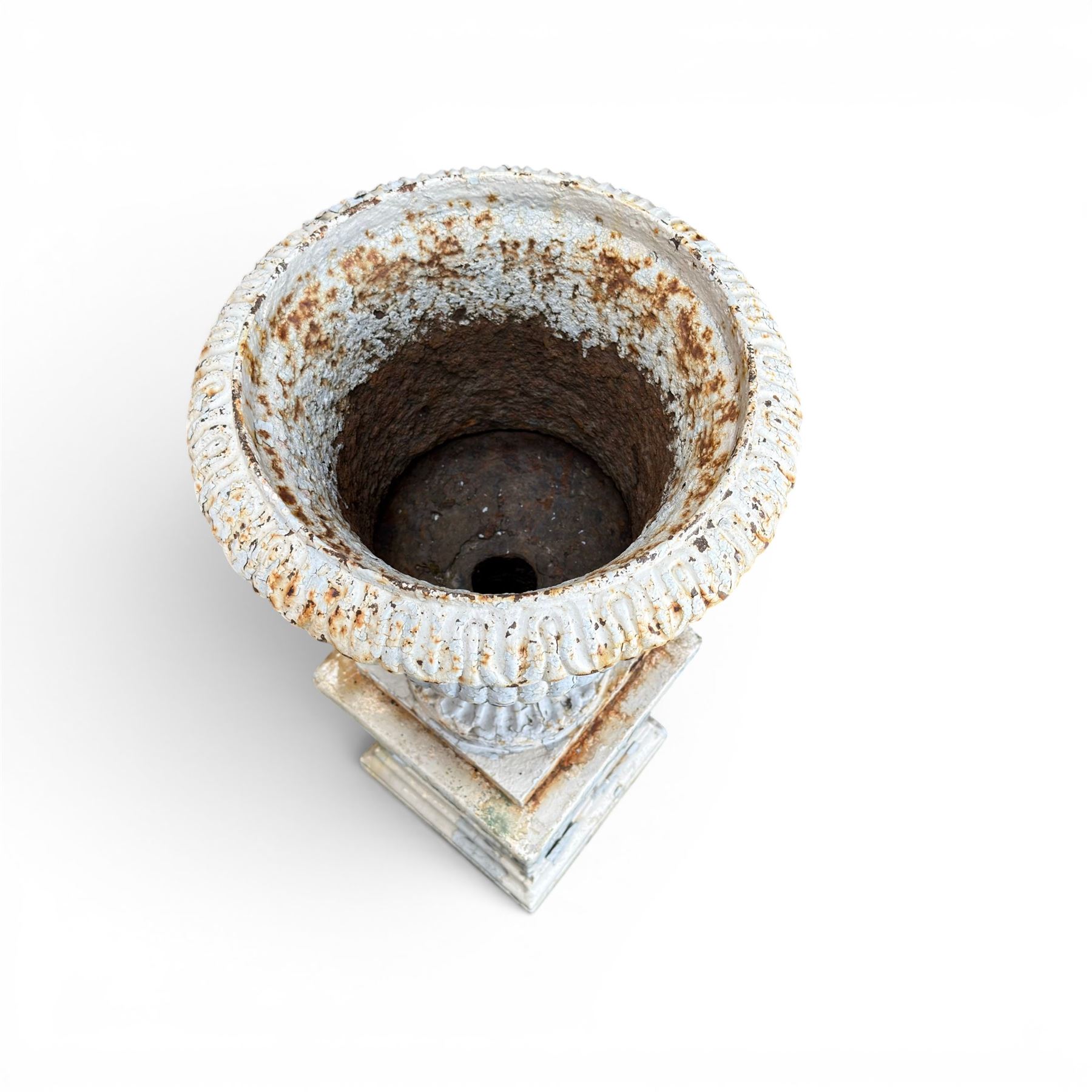 Victorian weathered heavy ornate cast iron garden centerpiece urn, distressed white and duck egg blue painted, raised on square plinth with rose detail 