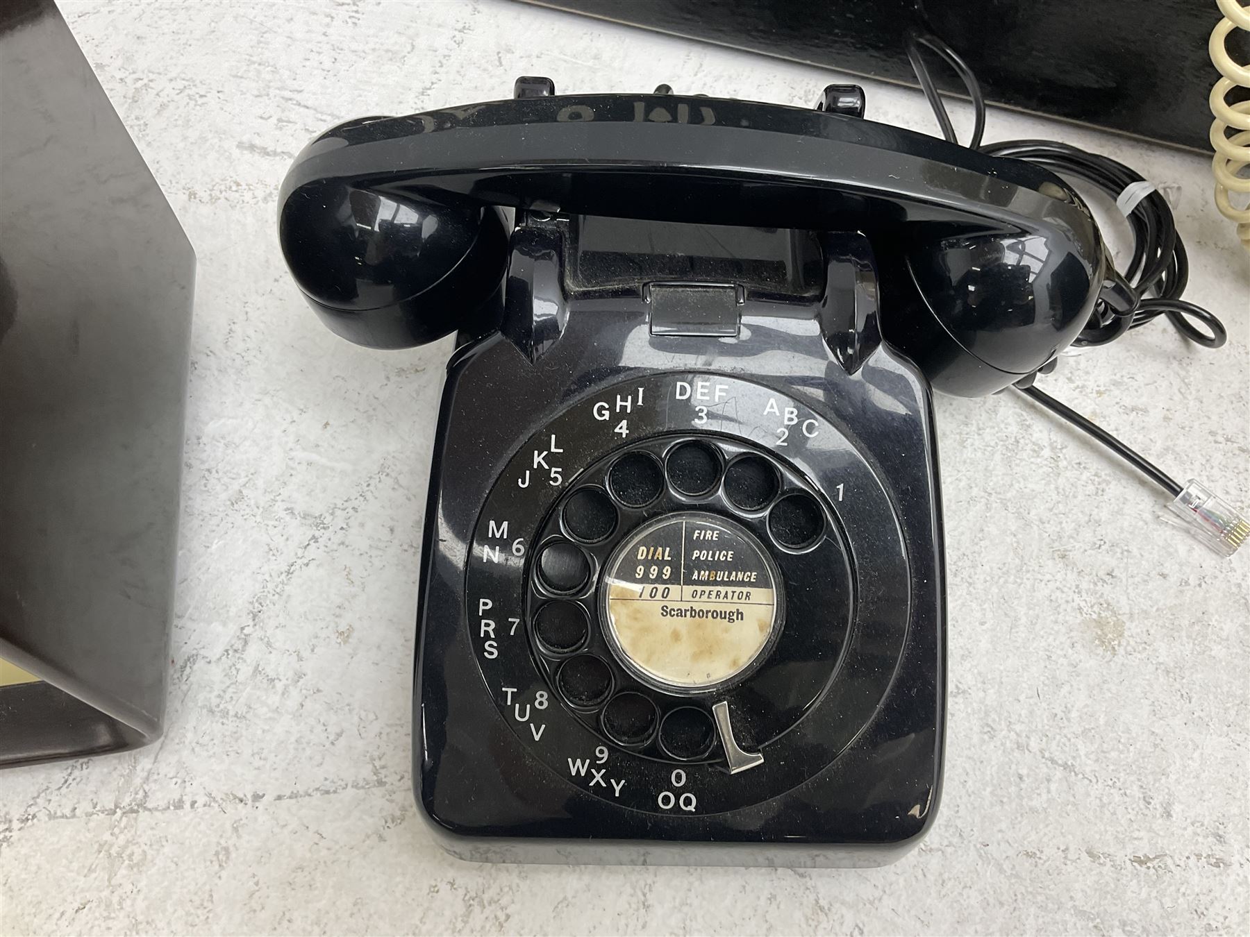 Vintage 1970s telephone mounted on board reading 'You May Telephone From Here', 1960s 706L telephone with 'G.P.O' stamp, 1953 Ecko U195 radio and 1955 Ecko U245 radio