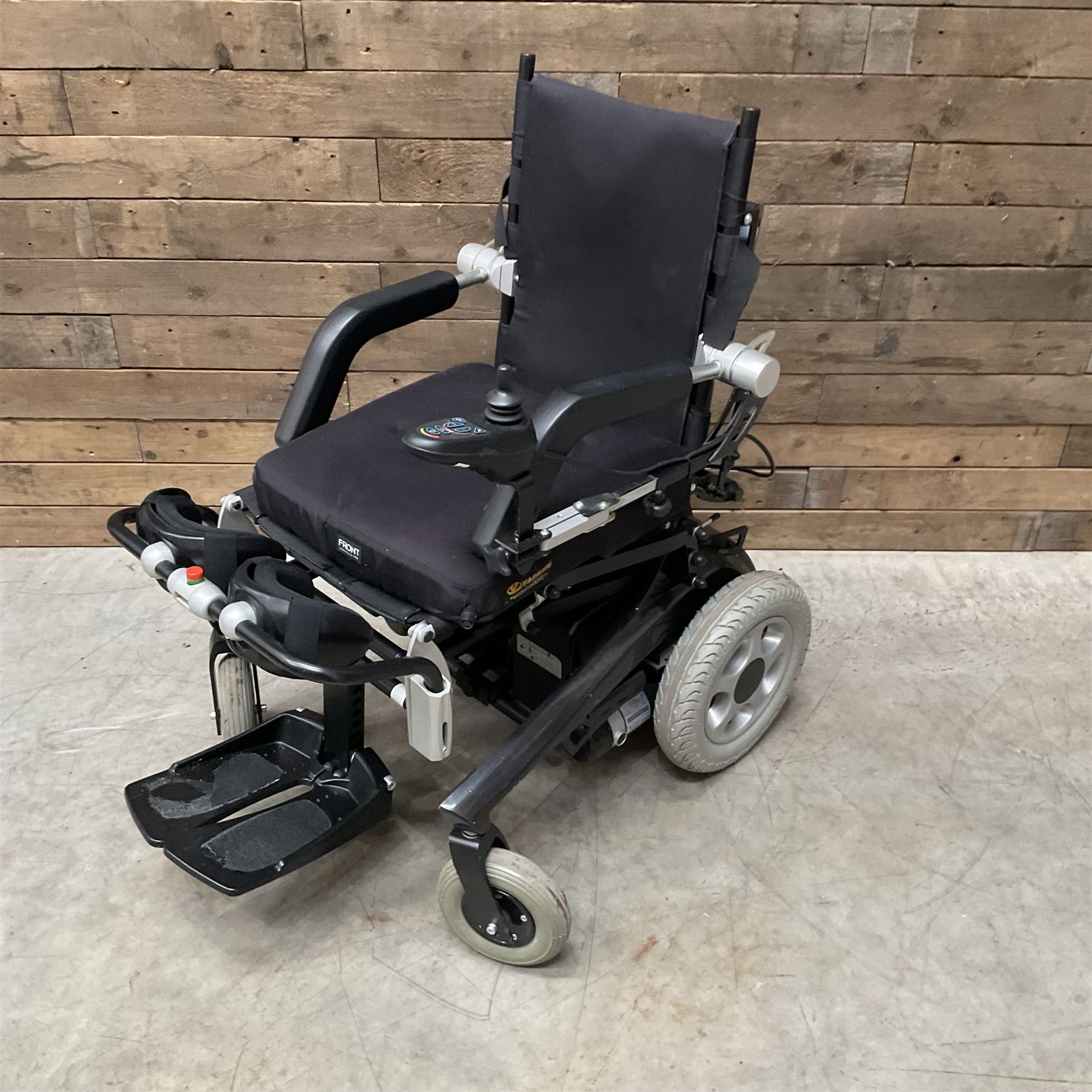 Permobil LSA Lifestand seated and standing wheelchair