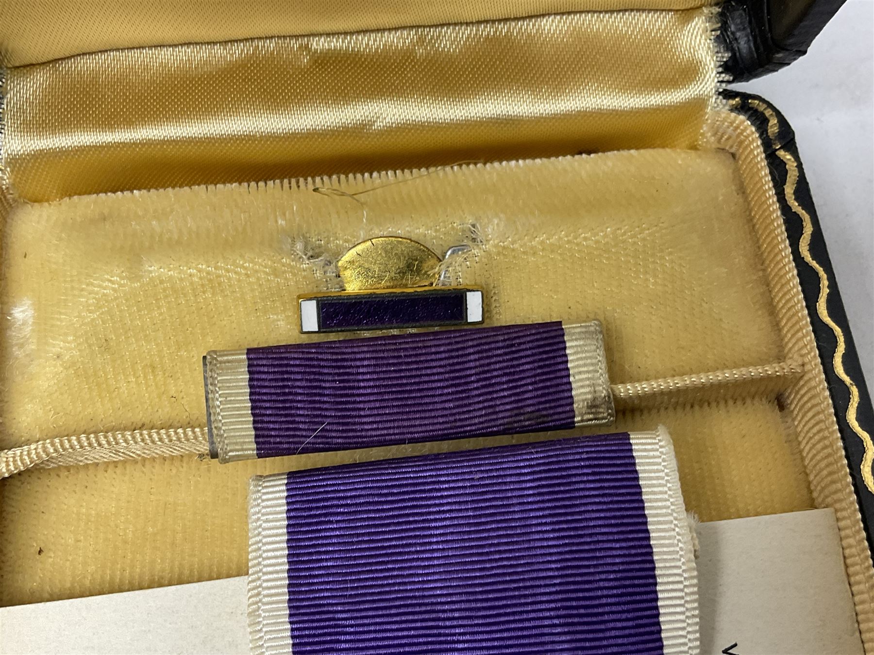 American Purple Heart Medal awarded to 32634848 Charles H. Poppo; cased with identity tags and paperwork; and Bronze Star Medal awarded to U.S. Marine Esteban T. Maranao; cased; American WWII Victory Medal and Asiatic Pacific Campaign Medal