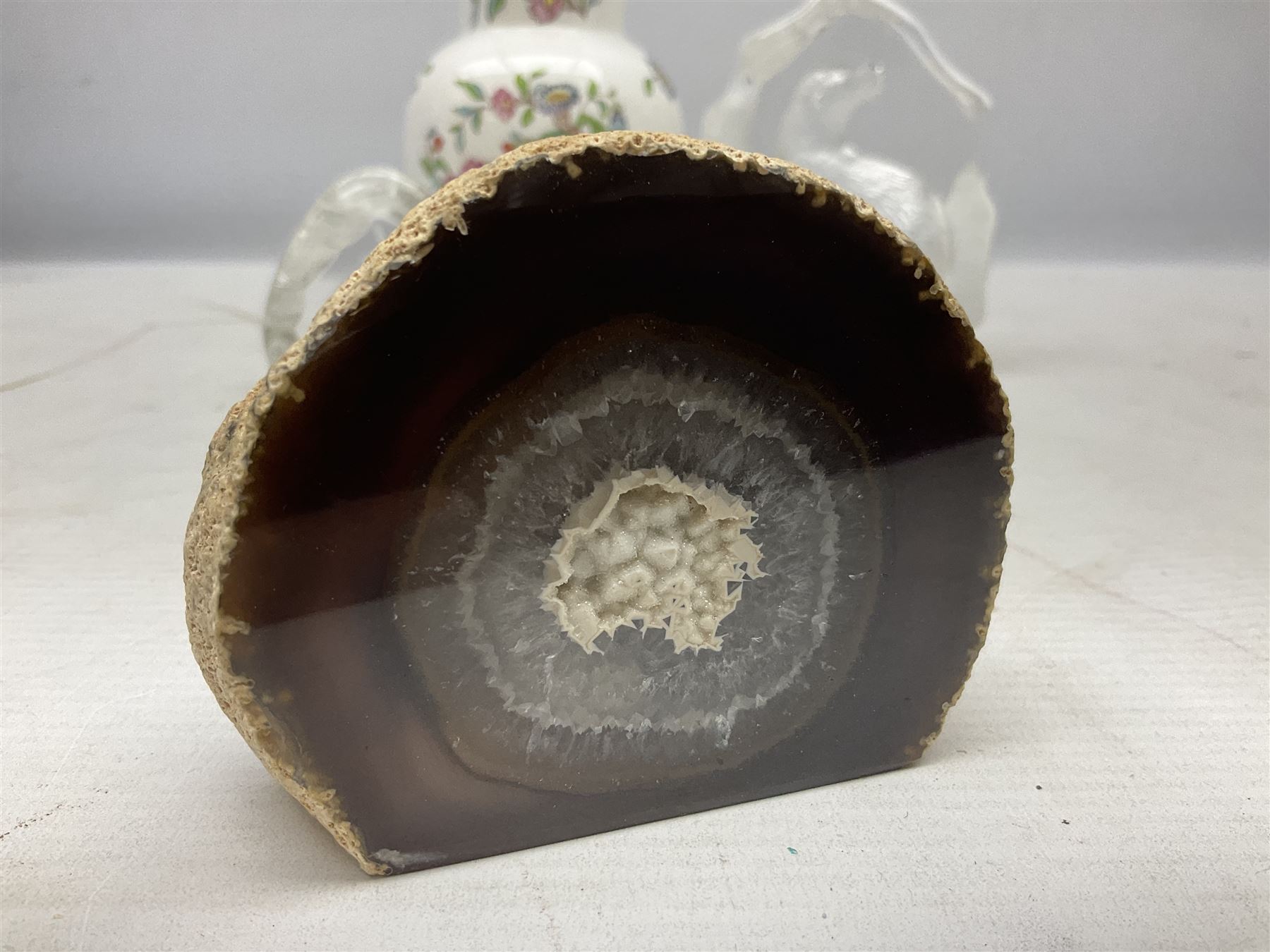 Mats Jonasson of Sweden glass Otter paperweight, Capredoni by Dartington Crystal Crysanthemum paperweight, boxed British Fossils agate geode, silver plated wine bottle coaster and Aynsley vase, etc, all boxed