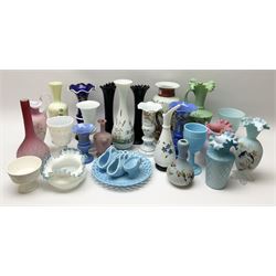 A group of mostly Victorian glassware, to include a number of Satin glass vases, a pair of moulded slag glass vases, a Sowerby blue milk glass lattice plate, and three Sowerby blue milk glass baskets, a selection of painted opaque and milk glass vases, etc. 