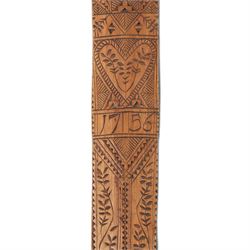 Treen carved a stay busk, dated 1756, the decorated with geometric boarded and foliate sprigs, with pierced top finished with three stars, H37cm
