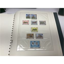 Mostly Queen Elizabeth II Great Britain and Isle of Man stamps including mint examples, housed in various albums, stockbooks and loose, in one box