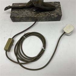 1930s Art Deco spelter table lamp, modelled as a nude woman holding aloft a spherical crizzled glass shade, upon a marble base, H48cm