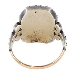 19th century 18ct gold and silver paste set portrait ring, octagonal miniature of a woman on ivory, under a glazed panel, with paste stone surround, to bifurcated paste set shoulders. This lot has been registered for sale under Section 10 of the APHA Ivory Act