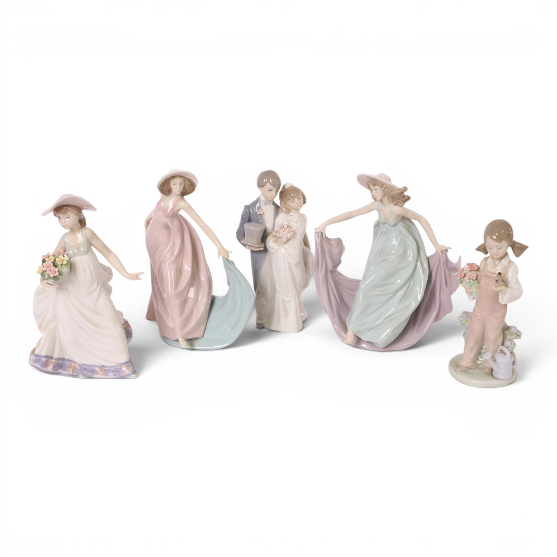 Five Lladro figures, comprising Spring Dance 5663, Spring 5217, Carefree 5790, May Dance 5662 and Wedding Bells 6164, all boxed