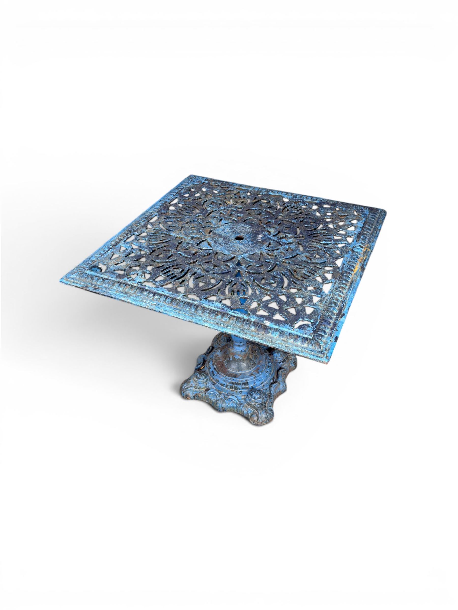 Victorian revival ornate cast iron garden table, pierced square top, pedestal base, finished in distressed blue paint