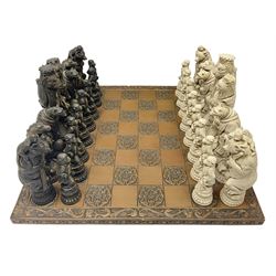 Chess set and resin chess pieces moulded as various animals, the pawns as monkeys, Kings as lions etc, board L46cm, W46cm, king H19cm